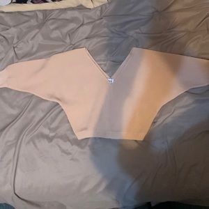 A Princess Polly crop top sweater